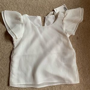 NWT H&M girls white top with silver shimmer